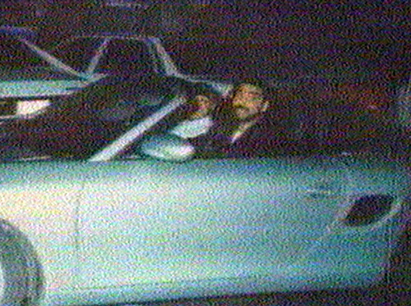 Image released by Iraqi news sources Wednesday April 30, 1997 showing President Hussein’s son Odai driving a car. Hussein’s eldest son was shot about 10 times on 12 December 1996 in Baghdad. Since then, he has been seen on television moving his arms but not his legs. He underwent surgery April 20 and told reporters he expected to resume his usual activities within several months. (AP Photo/Iraqi TV/APTV)